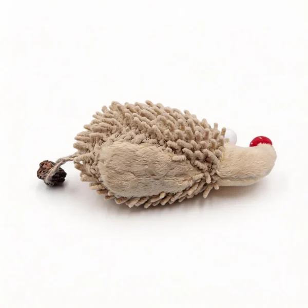 Chenille Hedgehog Cat Kicker Toy lying on a white background, with beige looped chenille plush, a red nose, soft eyes, and a silvervine fruit tail for cats to bat, bite, and kick.