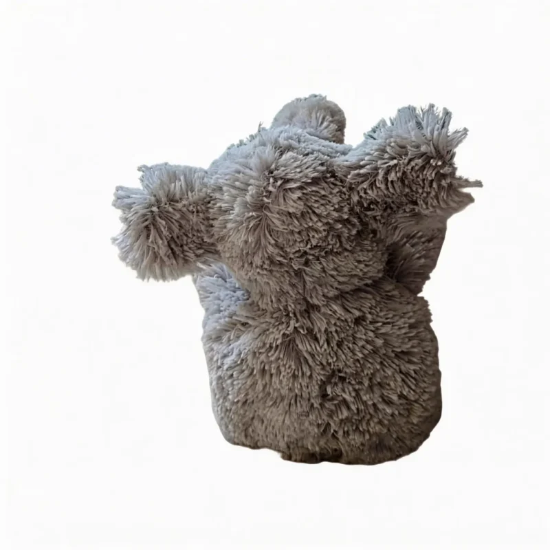 CloudCalm Baby-Soft Elephant Dog Toy shown from the back, highlighting the fluffy gray plush texture, soft ears, and rounded elephant shape.