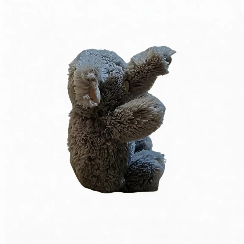 CloudCalm Baby-Soft Elephant Dog Toy shown from the side, highlighting the soft gray plush fabric, floppy ears, and huggable elephant body shape.