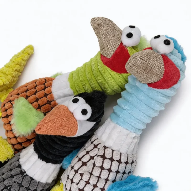 Beaky Buddy Long Neck Squeaky Plush Dog Toy Details Close-up of Beaky Buddy Long-Neck Squeaky Plush Dog Toy with textured plush body, long beak and soft details