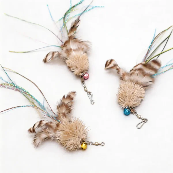 Three DeerFur Jellyfish Cat Wand Replacements with fluffy fur heads, colored bells, feather accents, and dangling tinsel teaser tails.