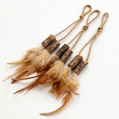 Natural Silvervine Feather Hang and Play Interactive Cat Chew Toy Set Silvervine Feather Hang and Play Interactive Cat Chew Toy set with natural silvervine wood pieces, hemp rope loops, and soft brown feathers for hanging, chasing, chewing, and batting.