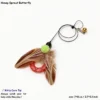 Honey Sprout Butterfly feather cat wand replacement with soft tan feathers, red mesh wing, green pom pom, and bell