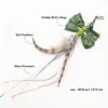 Forest Green Raffia Dragonfly Cat Wand Replacement showing crinkled raffia wings, soft feathers, shiny streamers, bell, and clip.