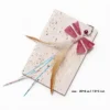 Blush Pink Raffia Dragonfly Cat Wand Replacement with pink raffia wings, soft feathers, shiny streamers, bell, and easy clip attachment.