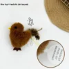 Cinnamon Finch Chirpy Bird Tap-Activated Plush Cat Toy with feather tail and pull tag, showing the feature text “One tap = realistic bird sounds.”
