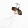 Twilight Moss Butterfly cat wand replacement with brown and green feathers, glitter mesh loop, black pom pom, and bell
