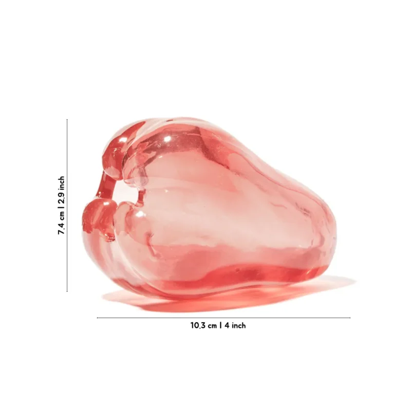 Milky Wax Apple Treat-Dispensing Dog Chew Toy Size Chart Milky Wax Apple Treat-Dispensing Natural Rubber Dog Chew Toy size chart showing a translucent red wax apple shape measuring 10.3 cm long and 7.4 cm tall.