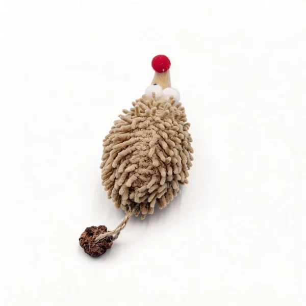Top view of the Chenille Hedgehog Cat Kicker Toy showing the textured beige chenille body, red plush nose, round eyes, and silvervine fruit attached by a short rope.