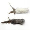 Cream White and Smoky Chirp Bunny Scent Enrichment Cat Kicker Toy options shown side by side, featuring soft rabbit fur bodies and natural feather tails.