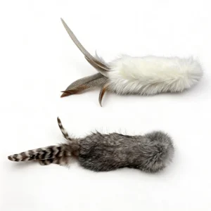 Cream White and Smoky Chirp Bunny Cat Kicker Toy Options Cream White and Smoky Chirp Bunny Scent Enrichment Cat Kicker Toy options shown side by side, featuring soft rabbit fur bodies and natural feather tails.