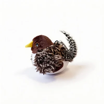 Speckled Sparrow Chirpy Bird Tap-Activated Interactive Cat Toy with a yellow beak, fluffy brown wings, spotted feather tail, and built-in hanging loop.