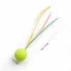 Bright Green Ball + Color Streamers Feather Bounce Ball Cat Toy for solo swatting and chase play