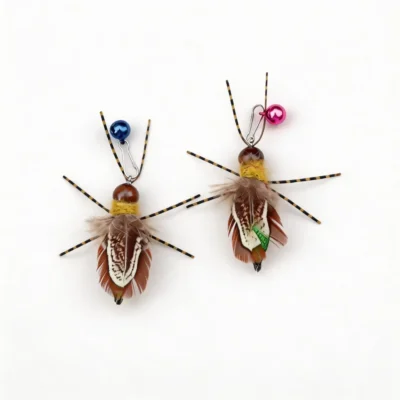 Firefly Flicker Feather Cat Teaser Refill Set Two Firefly Flicker Cat Wand Replacement refills with feather wings, striped antennae, shiny bell clips, and insect-like teaser shapes for cats.