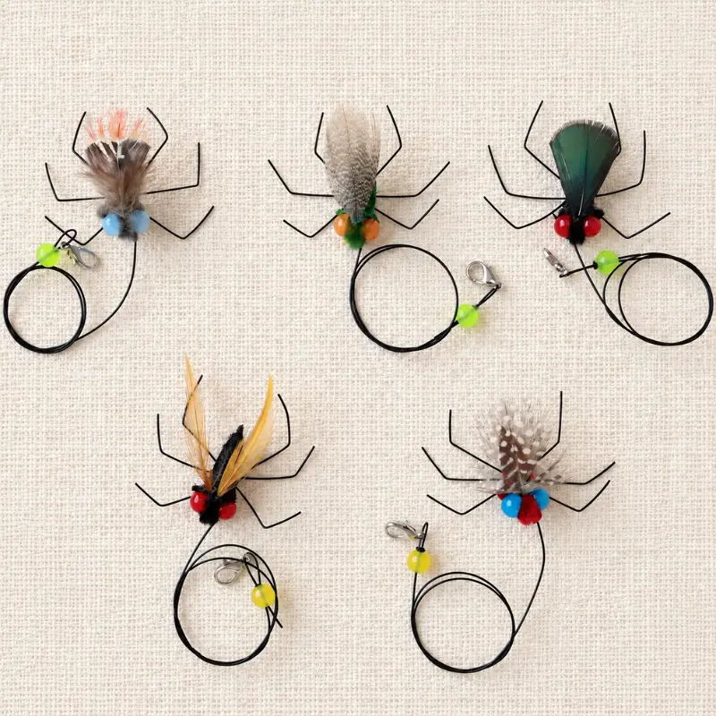 Five-piece fly insect cat toy feather wand replacement set with different feather colors and insect designs for indoor cats.