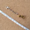 Golden Honey Bee flying insect cat toy with yellow body, translucent wings, and bell attachment, creating an interactive cat teaser for hunting-style play.