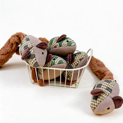 Green and Cocoa Long-Tail Crinkle Mouse Cat Toys displayed in a white basket, showing patterned burlap mouse bodies and soft crinkle plush tails.
