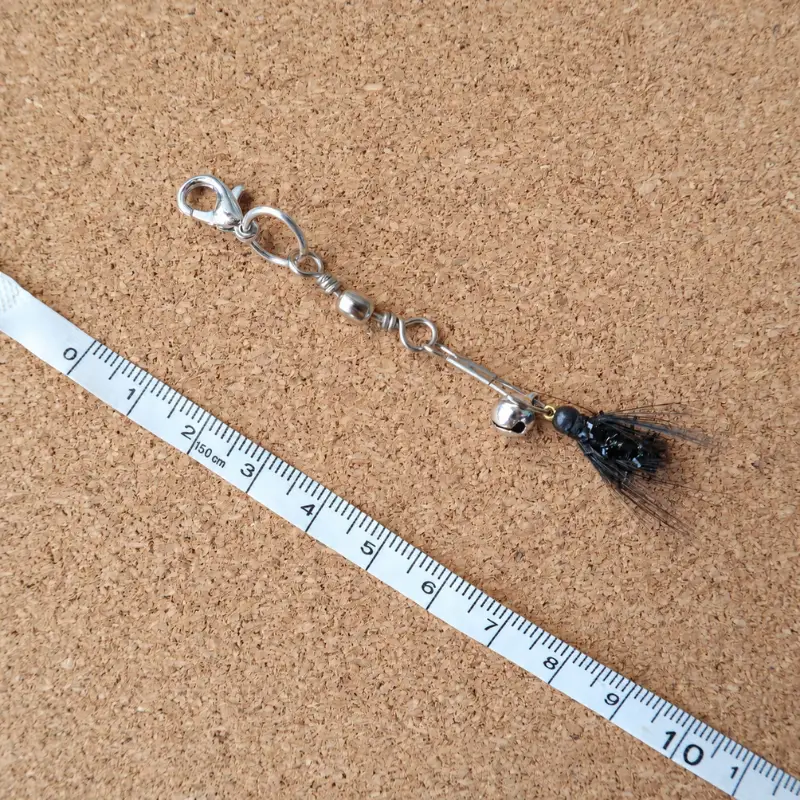 Midnight Mosquito cat teaser wand replacement featuring a tiny black flying insect design, feather-like wings, and bell detail for interactive cat teaser play.
