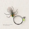 Patterned feather fly insect cat wand replacement set showing different colors and designs for rotating hunting toys for cats.