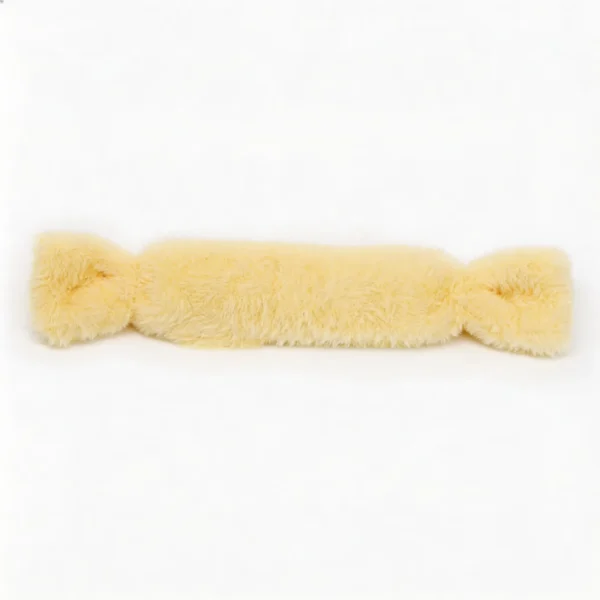 Buttercream Bunny Candy Rabbit Fur Candy Cat Kicker Pillow on a white background, featuring a long soft yellow plush candy shape for cats to bite, hug, wrestle, and kick.