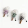 Lavender, Mint, and Ash Silvervine Fluffy Lollipop Cat Chew Toy variants with fluffy white tops, curled plush texture, silvervine sticks, black loops, and green bells.