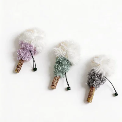 Lavender Mint Ash Silvervine Fluffy Lollipop Cat Chew Toy Variants Lavender, Mint, and Ash Silvervine Fluffy Lollipop Cat Chew Toy variants with fluffy white tops, curled plush texture, silvervine sticks, black loops, and green bells.