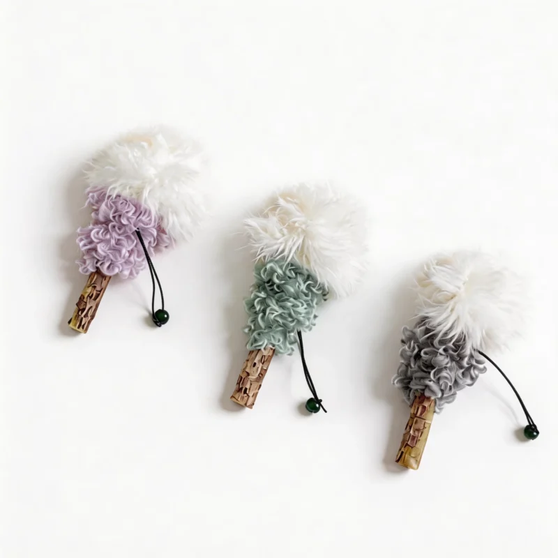 Lavender Mint Ash Silvervine Fluffy Lollipop Cat Chew Toy Variants Lavender, Mint, and Ash Silvervine Fluffy Lollipop Cat Chew Toy variants with fluffy white tops, curled plush texture, silvervine sticks, black loops, and green bells.