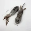 Smoky Chirp Bunny Scent Enrichment Cat Kicker Toy with grey rabbit fur and natural feathers, shown with 21 cm / 8.3 in length and 3.5 cm / 1.4 in width labels.