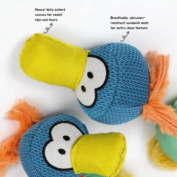 Close-up of the ToucanTuff Tug & Chew Plush Rope Dog Toy showing heavy-duty oxford canvas beak and breathable abrasion-resistant mesh head.