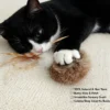 Bunny Fur Scent Enrichment Cat Toy variants in Wild Brown, Smoky Gray, and Cloud White with natural feather tails