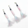 Woolie Shimmer Fish Cat Wand Replacement with iridescent sequin fish body, crinkle tinsel tail, brass bell, and secure clip for interactive cat play.