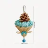 Blue Busy Beak Foraging Basket Bird Toy with wicker basket, crinkle paper, pine cone, and hanging bell
