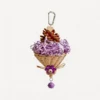 Purple Busy Beak Foraging Basket Bird Toy with crinkle paper, pine cone, wicker basket, and bell for small parrots