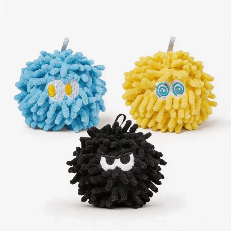 Fuzzy Mood Monsters Squeaky Dog Toy set in Starry Blue, Rocky Yellow, and Coal Mist chenille MopPuff styles.