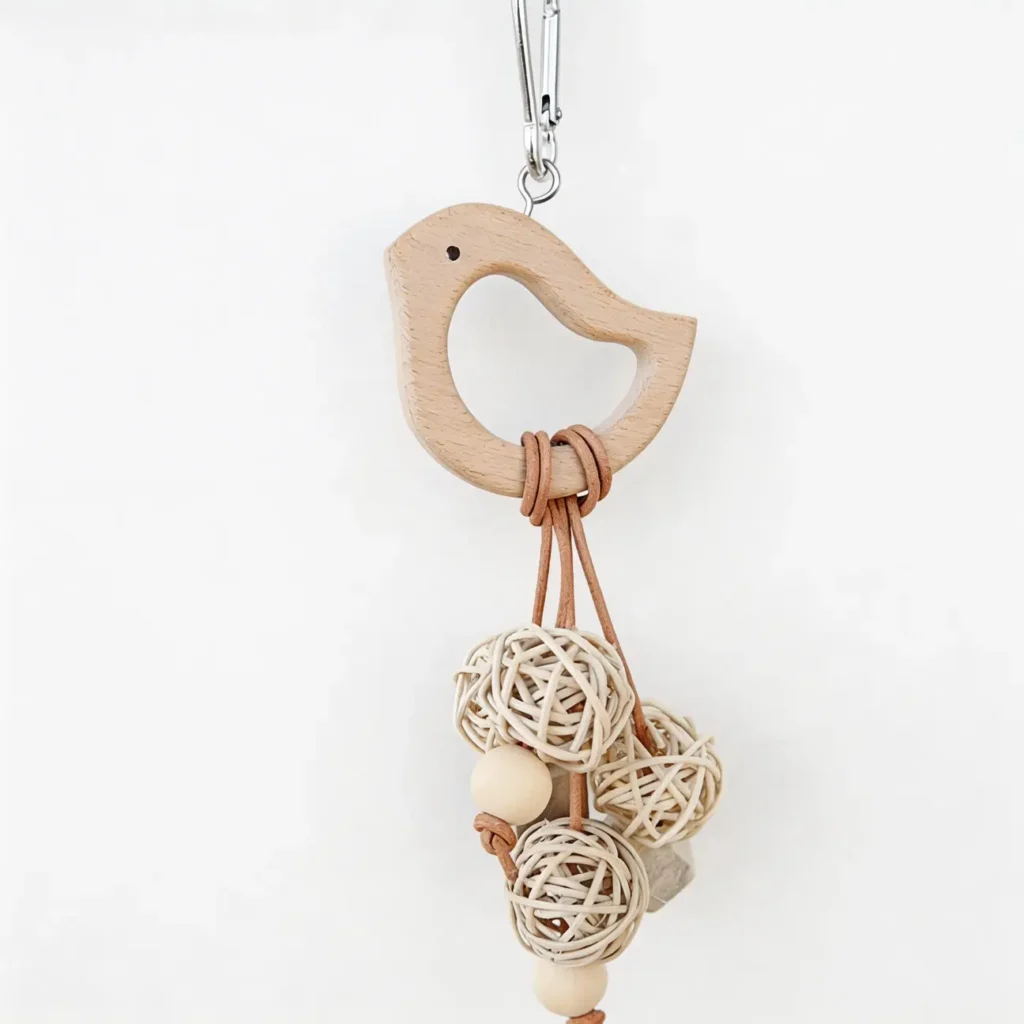 Little Beak Natural Bird Chew Toy with wooden bird shape, rattan balls, beads, and hanging cords for small parrots