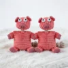 Piggy Puff No-Stuffing Squeaky Dog Toy in pink plush pig design for indoor dog play