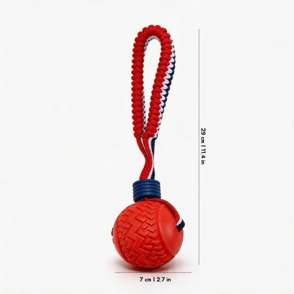 Red Tire Tread SportLoop Textured Tug Ball Dog Toy with rubber tire texture ball and red bungee tug handle, 7 cm by 29 cm
