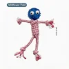Pink Scarecrow Rope Tug Dog Toy with blue textured rubber head, braided rope body, and playful knotted arms and legs