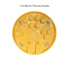 Busy Bites Dog Enrichment Puzzle Feeder with four non-slip suction pads to stay put during play