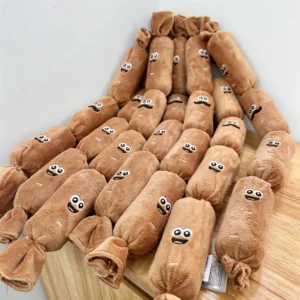 Sausage Squad 4 Squeak Plush Dog Toy Multiple Multiple Sausage Squad 4-Squeak Plush Dog Toys arranged on a wooden surface, showing the long plush sausage shape and playful embroidered faces.