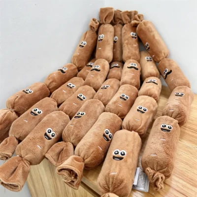 Sausage Squad 4 Squeak Plush Dog Toy Multiple Multiple Sausage Squad 4-Squeak Plush Dog Toys arranged on a wooden surface, showing the long plush sausage shape and playful embroidered faces.