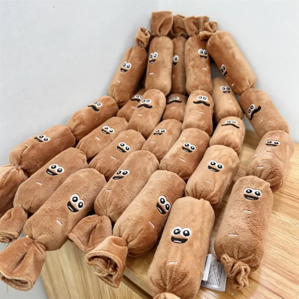 Multiple Sausage Squad 4-Squeak Plush Dog Toys arranged on a wooden surface, showing the long plush sausage shape and playful embroidered faces.