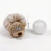 Cream bear plush squeaky dog ball toy shown beside the squeaker ball insert, with 18 cm height and 11 cm width marked.