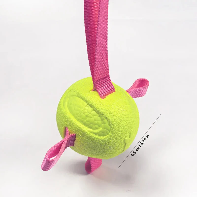 Lime Etpu Dog Fetch Ball Pink Strap Size Detail Close-up of the Lime Ball with Pink Strap, showing the 9.5 cm / 3.74 in size of the soft-bite ETPU dog fetch ball.