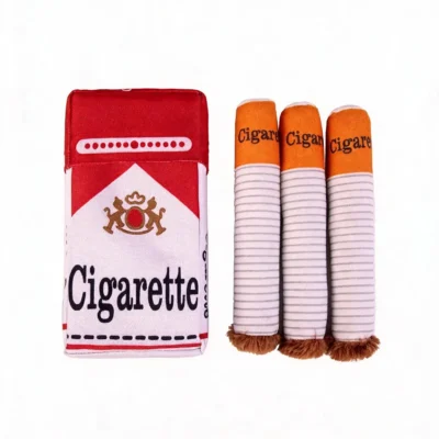 cigarette-dog-toys-three-piece-set Cigarette dog toys set with one red plush pack and three removable cigarette-shaped toys on a white background.