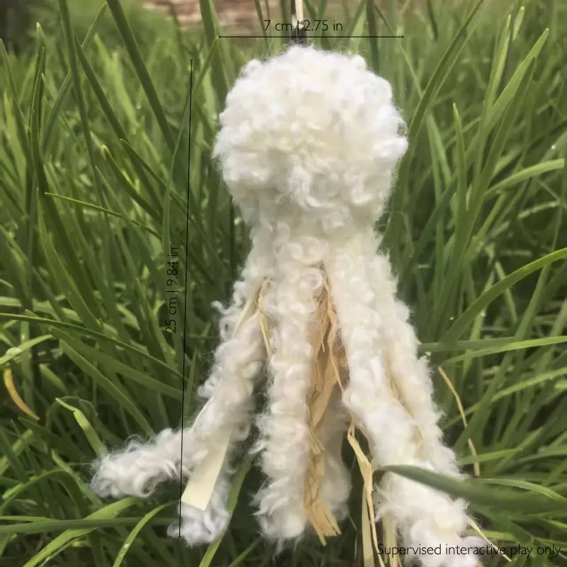 Curly wool kicker cat toy showing its 25cm size and fluffy texture for grabbing, biting, and kicking play.