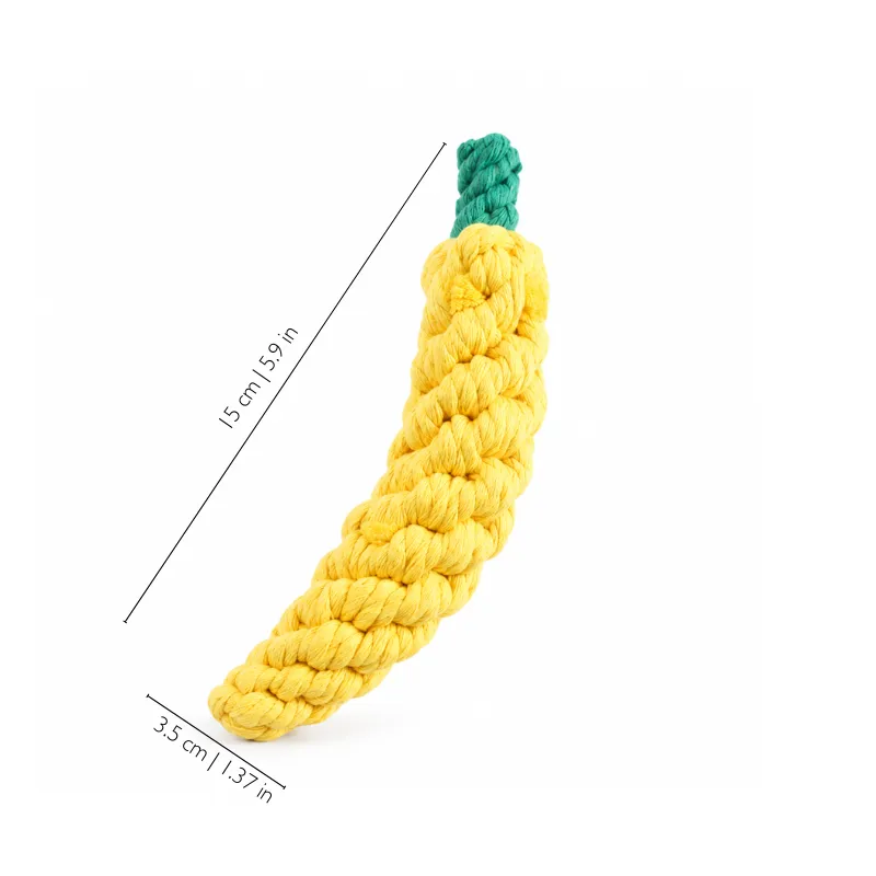 Yellow banana small dog rope toy with a green stem, measuring about 15 x 3.5 cm for sideways carrying and gentle play.