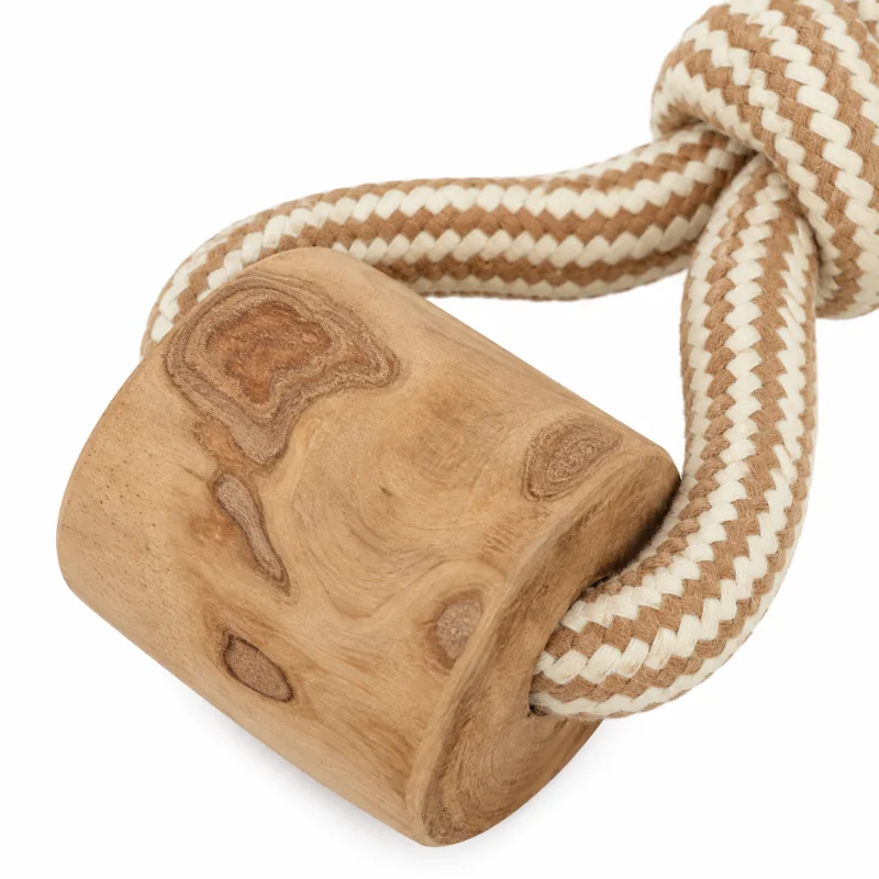 coffee-wood-dog-chew-rope-tug-toy-detail Close-up of a coffee wood dog chew section connected with braided cotton rope, showing the natural wood texture and detailed design of this dog rope tug toy.