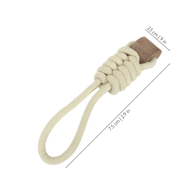 coffee-wood-rope-dog-tug-toy-single-handle Single handle coffee wood rope dog tug toy with handwoven cotton rope and wood chew section designed for interactive play and rope chew toys for dogs.