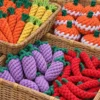 Colorful vegetable rope toy set featuring handmade cotton rope carrots, pumpkins, eggplants, and chili peppers, creating fun toy options for puppies and apartment dogs.